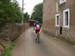Marty riding through one of the little village streets